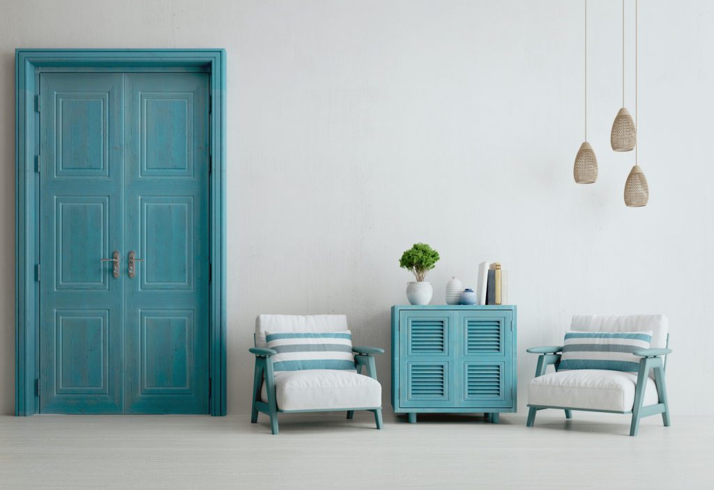 Santorini style interior with cabinet armchairs door and ceiling lamp.3d rendering