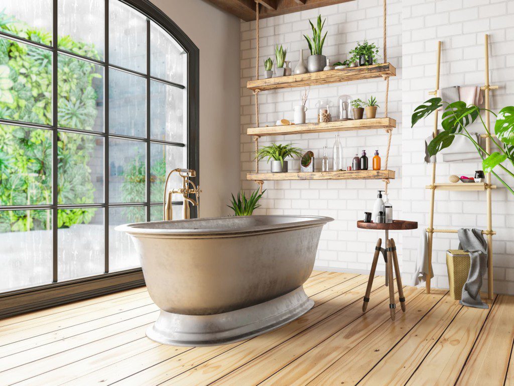 Banheiro industrial com pintura e objetos de decoração em cores frias. Imagem disponível em Getty Images.