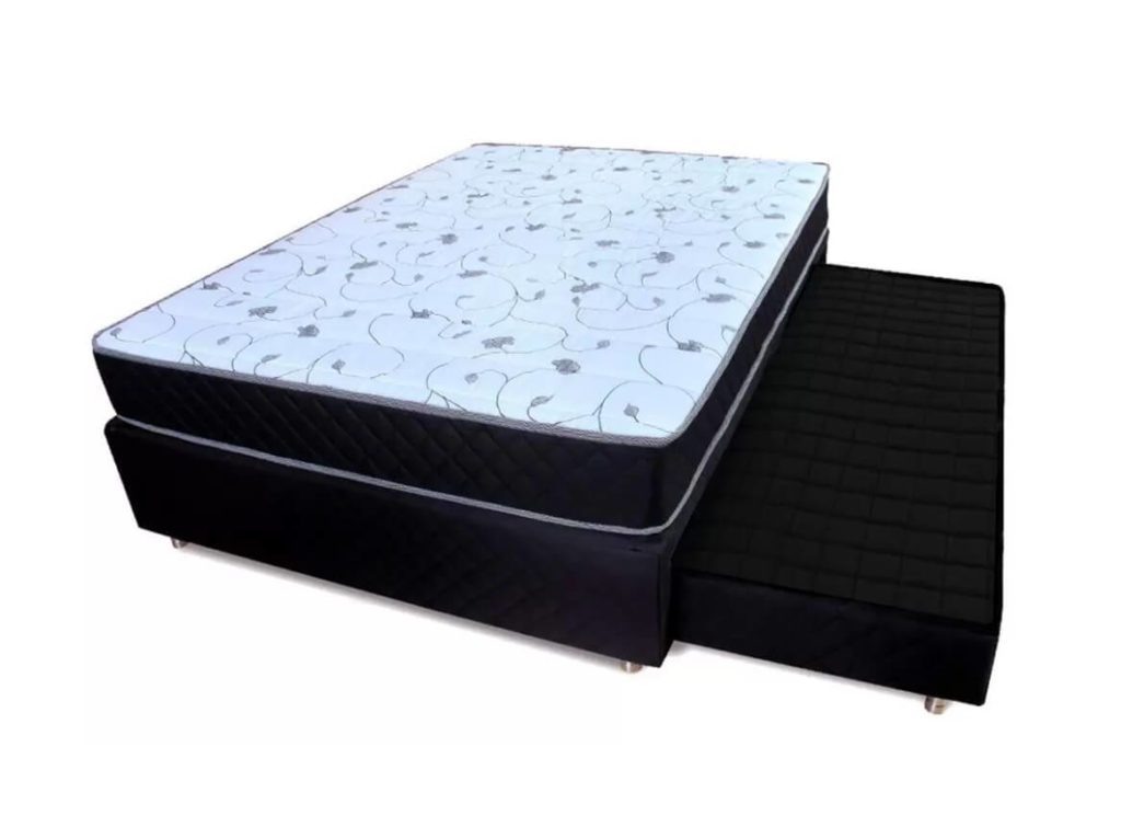 Foto que ilustra matéria sobre tipos de cama mostra uma cama box com outra cama auxiliar com rodinhas que saí por baixo.
