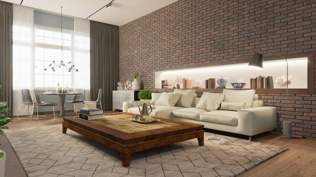 Sala de estar que mistura um pouco de rústico com clássico, parede com revestimento 3D em tijolinhos, mesa de centro em madeira, e prateleira embutida atrás do sofá. 